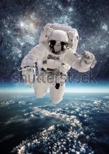 Фотообои Астронавт в космосе на фоне планеты Земля