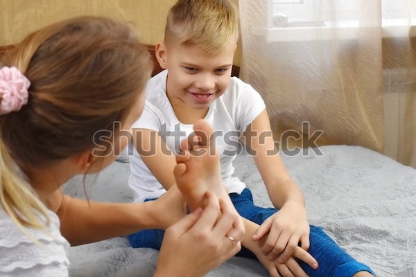 Tickle mom feet